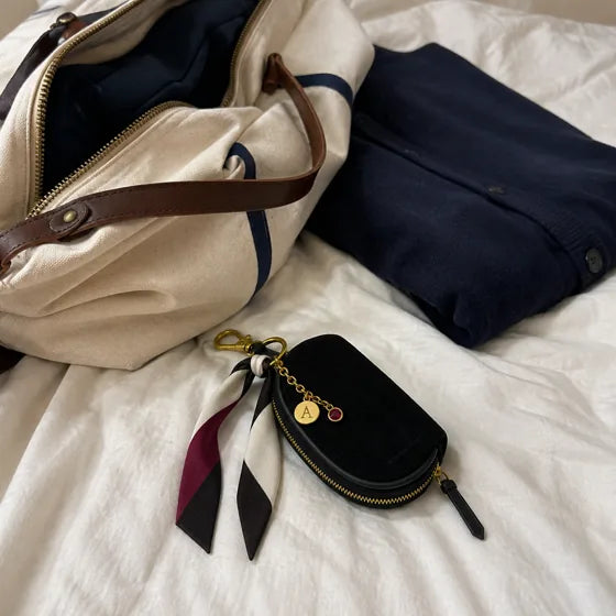 Lifestyle imagery: Styled Black Mini with weekend packing