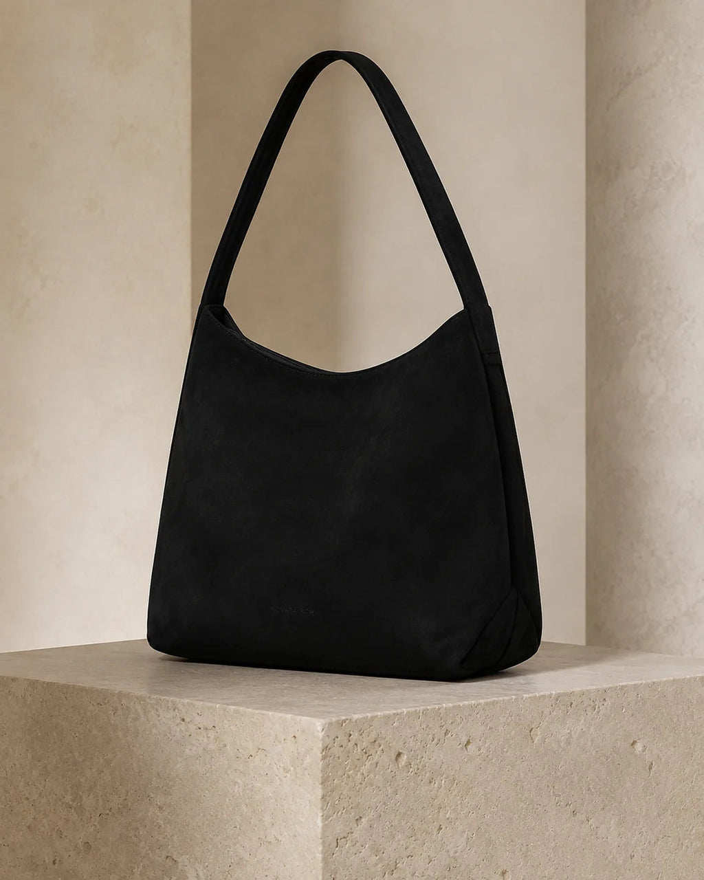 Onyx Porter 24 on limestone — studio product view