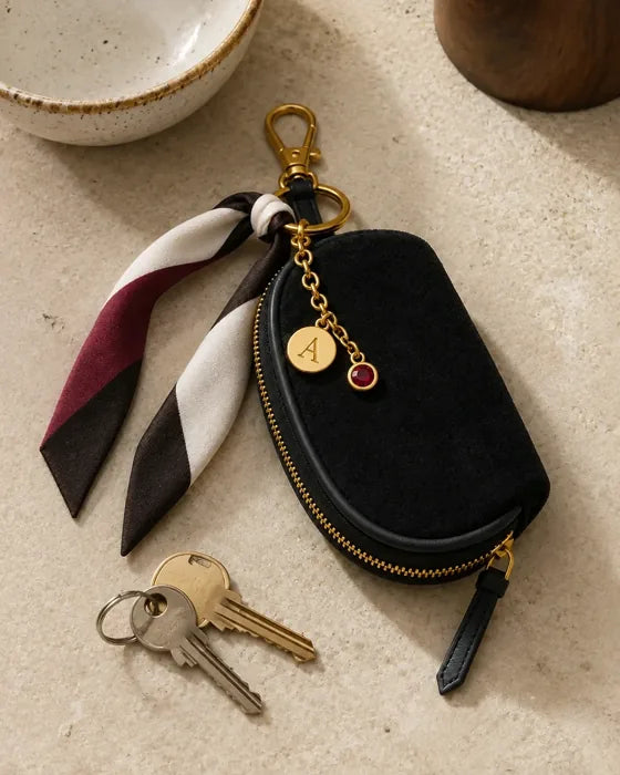 Lifestyle imagery: Styled Black Mini beside house keys on a counter